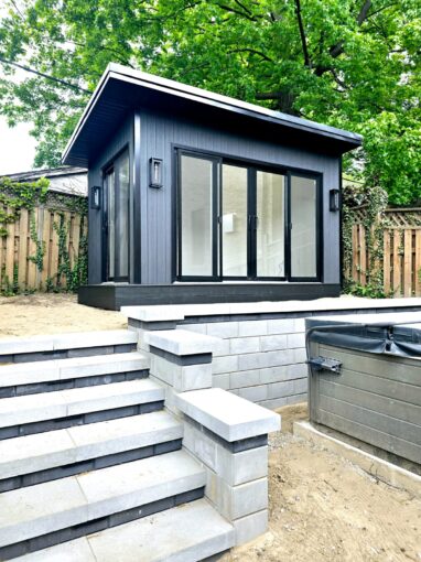 modern insulated garden room with large windows, built on-site by Garden Haus.