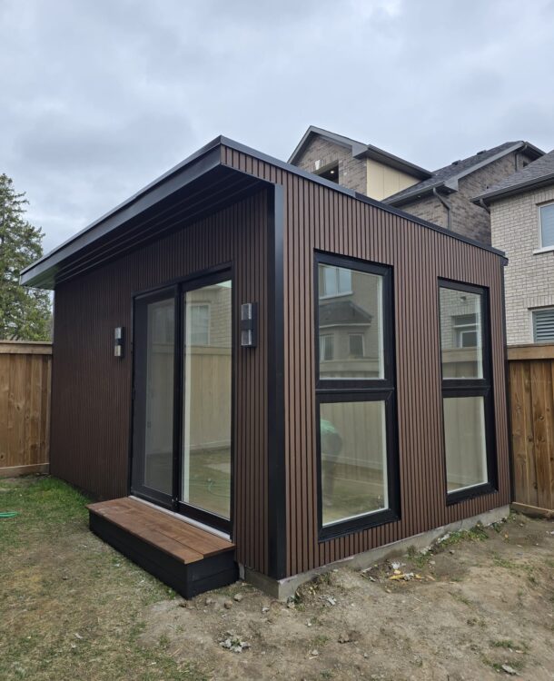 modern insulated garden room with large windows, built on-site by Garden Haus.