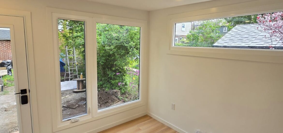Custom backyard office garden room built by GardenHaus with floor-to-ceiling windows