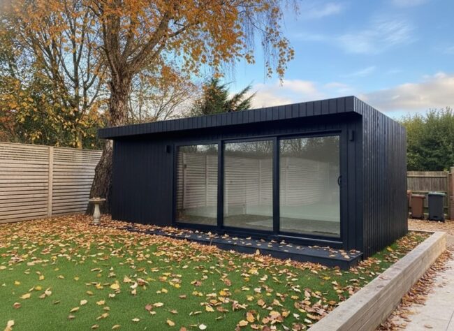 nterior of a modern garden room studio with natural light and minimalist design