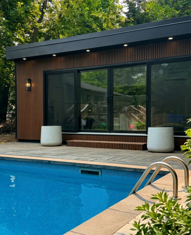 Luxury garden room Toronto custom built on site with modern wood-look siding and floor-to-ceiling windows